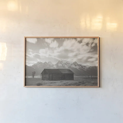 Grand Teton Settlers by Nathan Larson. shown as a paper print in a natural frame. Available as a archival giclee rolled canvas, fine art paper, or poster print. SKU 92473i.