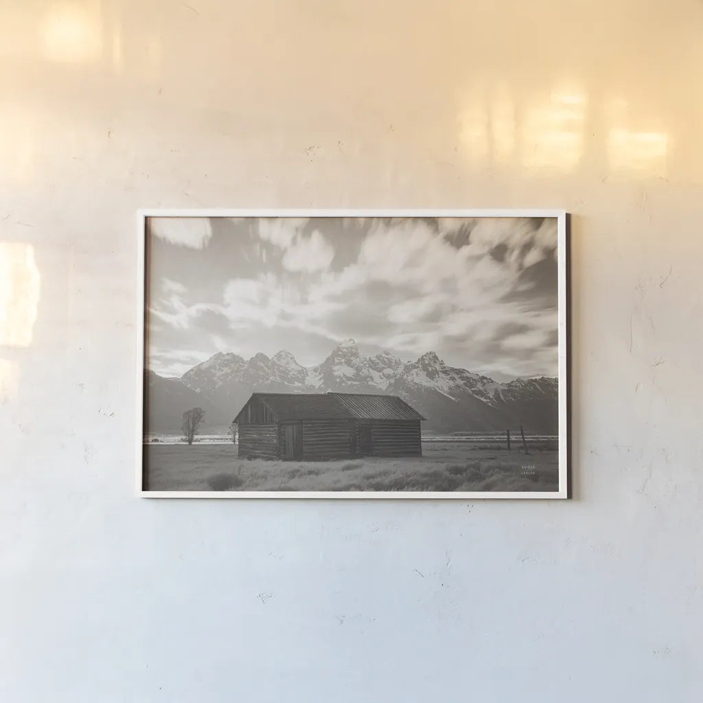 Grand Teton Settlers by Nathan Larson. shown as a paper print in a white frame. Available as a archival giclee rolled canvas, fine art paper, or poster print. SKU 92473i.