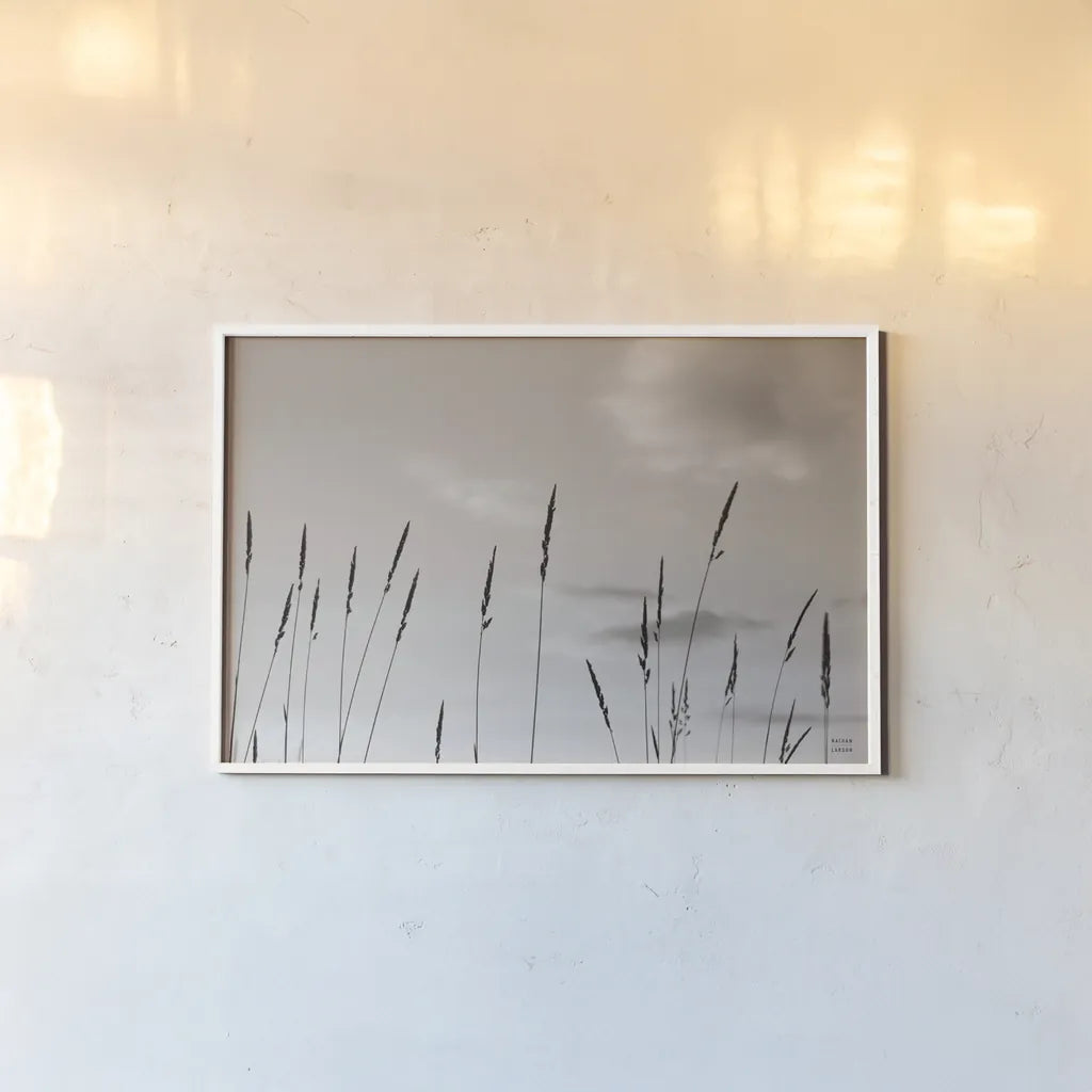 Grasslands by Nathan Larson. shown as a paper print in a white frame. Available as a archival giclee rolled canvas, fine art paper, or poster print. SKU 83985i.