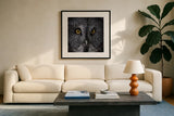 Great Grey Owl by Nathan Larson. Displayed in a glass frame with matte in a clean modern living room. Available as an archival giclee rolled canvas, fine art paper, or poster print. SKU 70524a.