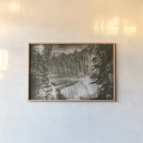 Hidden Falls by Nathan Larson. shown as a paper print in a natural frame. Available as a archival giclee rolled canvas, fine art paper, or poster print. SKU 82410i.
