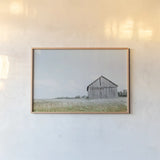 Hideout by Nathan Larson. shown as a paper print in a natural frame. Available as a archival giclee rolled canvas, fine art paper, or poster print. SKU 78864i.