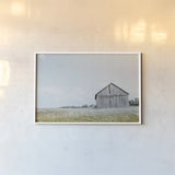 Hideout by Nathan Larson. shown as a paper print in a white frame. Available as a archival giclee rolled canvas, fine art paper, or poster print. SKU 78864i.