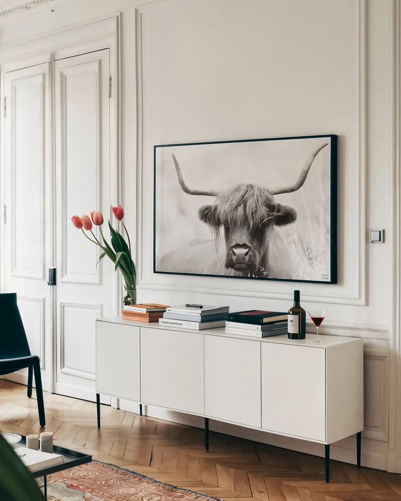 Highland Meadow Portrait BW by Nathan Larson. shown as a framed stretched canvas in a living room above a console. Available as a archival giclee rolled canvas, fine art paper, or poster print. SKU 100485i.