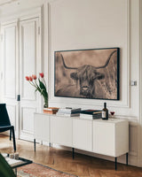 Highland Meadow Portrait Sepia by Nathan Larson. shown as a framed stretched canvas in a living room above a console. Available as a archival giclee rolled canvas, fine art paper, or poster print. SKU 100484i.