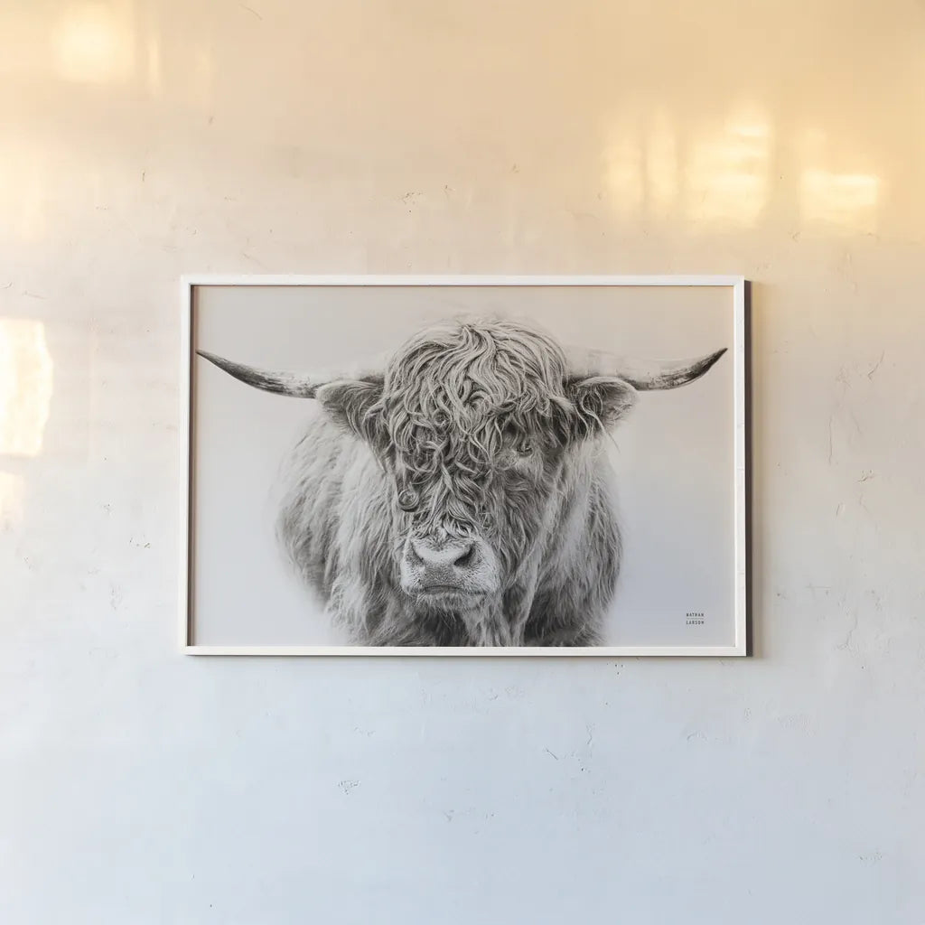 Highland in the Winter Fog BW by Nathan Larson. shown as a paper print in a white frame. Available as a archival giclee rolled canvas, fine art paper, or poster print. SKU 77566i.