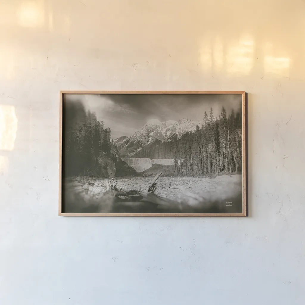 Hike to the Falls by Nathan Larson. shown as a paper print in a natural frame. Available as a archival giclee rolled canvas, fine art paper, or poster print. SKU 82411i.