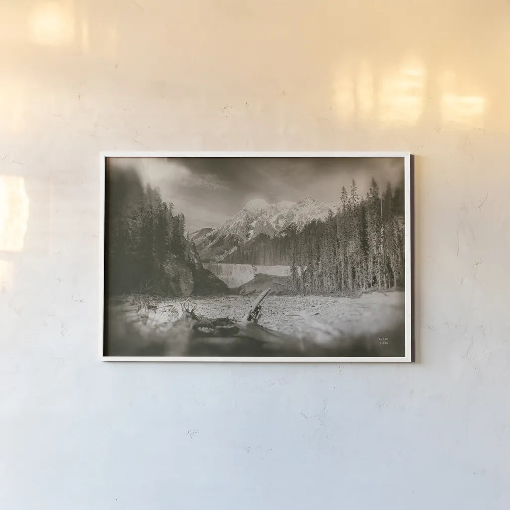 Hike to the Falls by Nathan Larson. shown as a paper print in a white frame. Available as a archival giclee rolled canvas, fine art paper, or poster print. SKU 82411i.
