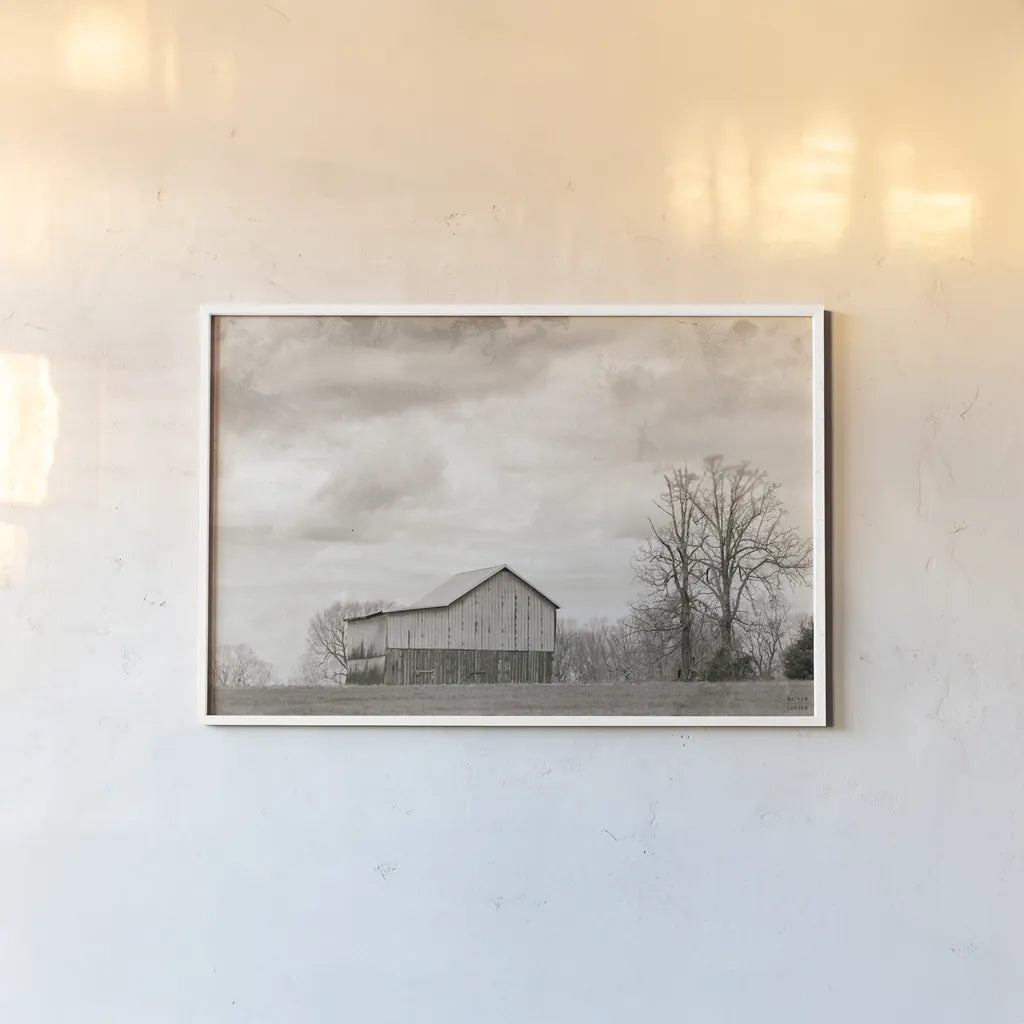 Hilltop Barn View by Nathan Larson. shown as a paper print in a white frame. Available as a archival giclee rolled canvas, fine art paper, or poster print. SKU 98029i.