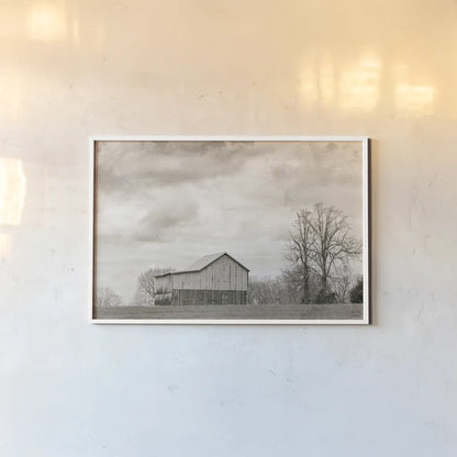Hilltop Barn View by Nathan Larson. shown as a paper print in a white frame. Available as a archival giclee rolled canvas, fine art paper, or poster print. SKU 98029i.