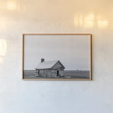 Holding On BW by Nathan Larson. shown as a paper print in a natural frame. Available as a archival giclee rolled canvas, fine art paper, or poster print. SKU 98155i.