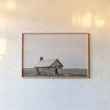 Holding On Sepia by Nathan Larson. shown as a paper print in a natural frame. Available as a archival giclee rolled canvas, fine art paper, or poster print. SKU 98154i.