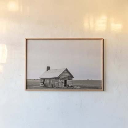 Holding On Sepia by Nathan Larson. shown as a paper print in a natural frame. Available as a archival giclee rolled canvas, fine art paper, or poster print. SKU 98154i.