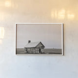 Holding On Sepia by Nathan Larson. shown as a paper print in a white frame. Available as a archival giclee rolled canvas, fine art paper, or poster print. SKU 98154i.