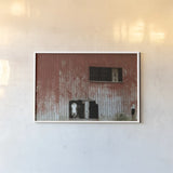 Hole in the Wall by Nathan Larson. shown as a paper print in a white frame. Available as a archival giclee rolled canvas, fine art paper, or poster print. SKU 89480i.