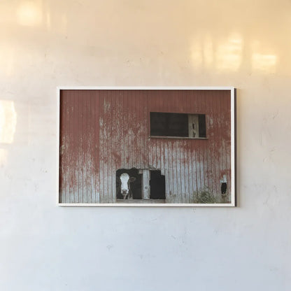 Hole in the Wall by Nathan Larson. shown as a paper print in a white frame. Available as a archival giclee rolled canvas, fine art paper, or poster print. SKU 89480i.