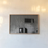 Hole in the Wall II by Nathan Larson. shown as a paper print in a natural frame. Available as a archival giclee rolled canvas, fine art paper, or poster print. SKU 89481i.