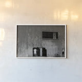 Hole in the Wall II by Nathan Larson. shown as a paper print in a white frame. Available as a archival giclee rolled canvas, fine art paper, or poster print. SKU 89481i.