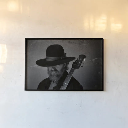 Home on the Range Cowboy I by Nathan Larson. shown as a paper print in a black flame. Available as a archival giclee rolled canvas, fine art paper, or poster print. SKU 77195i.