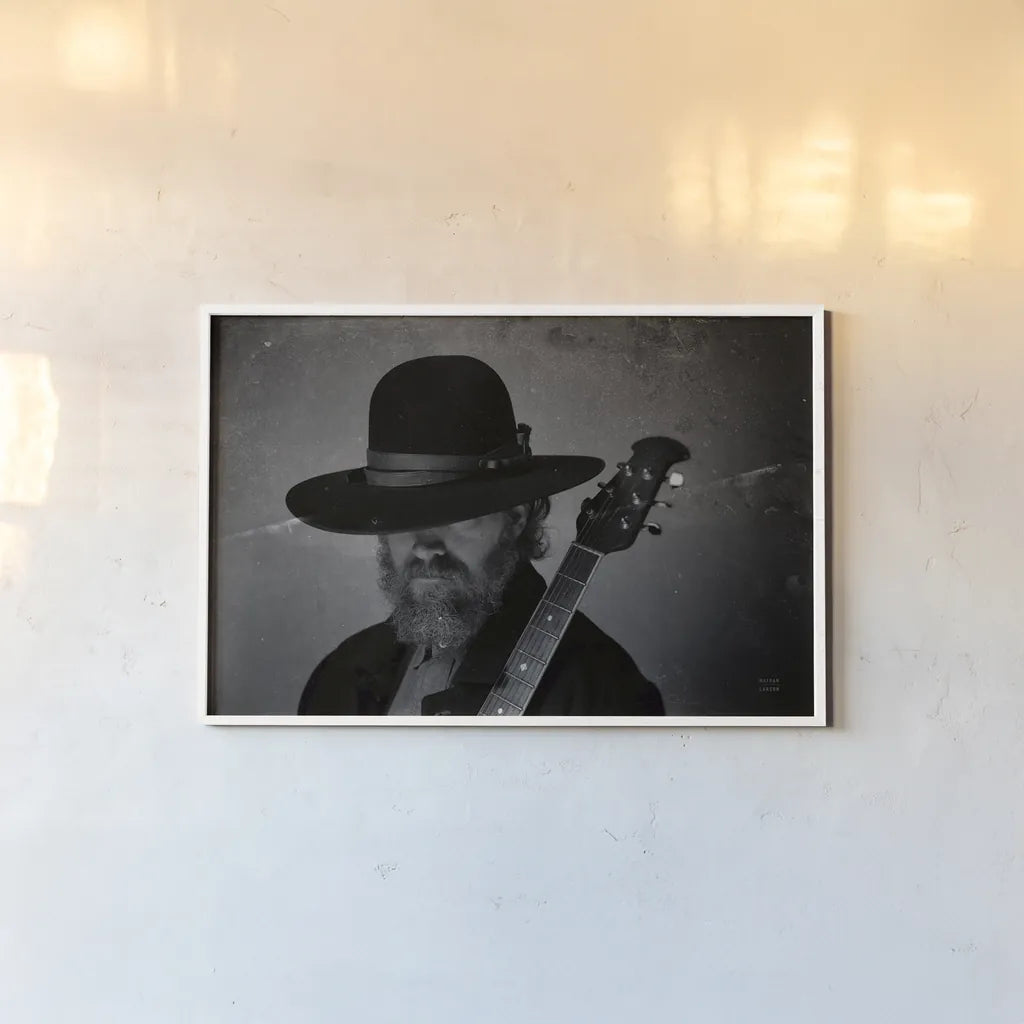 Home on the Range Cowboy I by Nathan Larson. shown as a paper print in a white frame. Available as a archival giclee rolled canvas, fine art paper, or poster print. SKU 77195i.