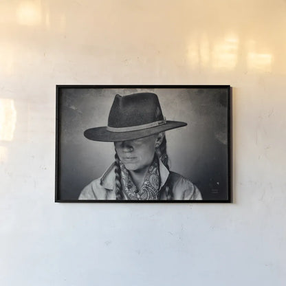 Home on the Range Cowgirl I by Nathan Larson. shown as a paper print in a black flame. Available as a archival giclee rolled canvas, fine art paper, or poster print. SKU 77197i.