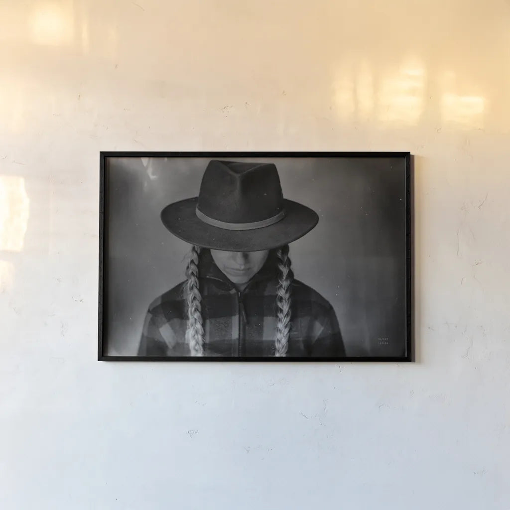 Home on the Range Cowgirl II by Nathan Larson. shown as a paper print in a black flame. Available as a archival giclee rolled canvas, fine art paper, or poster print. SKU 77198i.