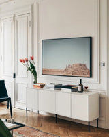Homeland II by Nathan Larson. shown as a framed stretched canvas in a living room above a console. Available as a archival giclee rolled canvas, fine art paper, or poster print. SKU 86711i.