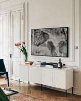 Horse Profile BW by Nathan Larson. shown as a framed stretched canvas in a living room above a console. Available as a archival giclee rolled canvas, fine art paper, or poster print. SKU 89463i.