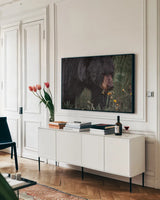 Hungry Bear by Nathan Larson. shown as a framed stretched canvas in a living room above a console. Available as a archival giclee rolled canvas, fine art paper, or poster print. SKU 100756i.
