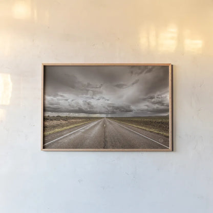 Into The Storm by Nathan Larson. shown as a paper print in a natural frame. Available as a archival giclee rolled canvas, fine art paper, or poster print. SKU 70271i.