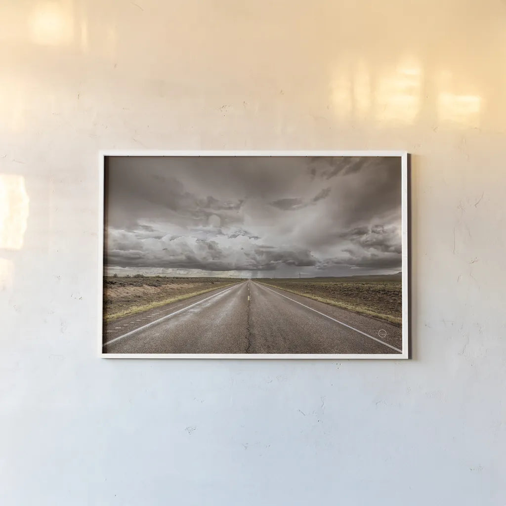 Into The Storm by Nathan Larson. shown as a paper print in a white frame. Available as a archival giclee rolled canvas, fine art paper, or poster print. SKU 70271i.
