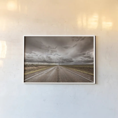 Into The Storm by Nathan Larson. shown as a paper print in a white frame. Available as a archival giclee rolled canvas, fine art paper, or poster print. SKU 70271i.