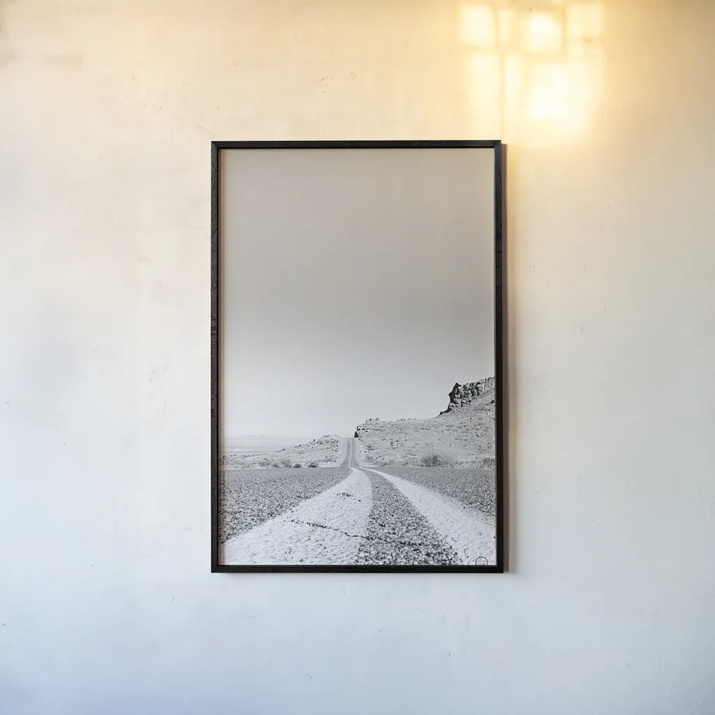 Into the Desert by Nathan Larson. shown as a paper print in a black flame. Available as a archival giclee rolled canvas, fine art paper, or poster print. SKU 72025h.