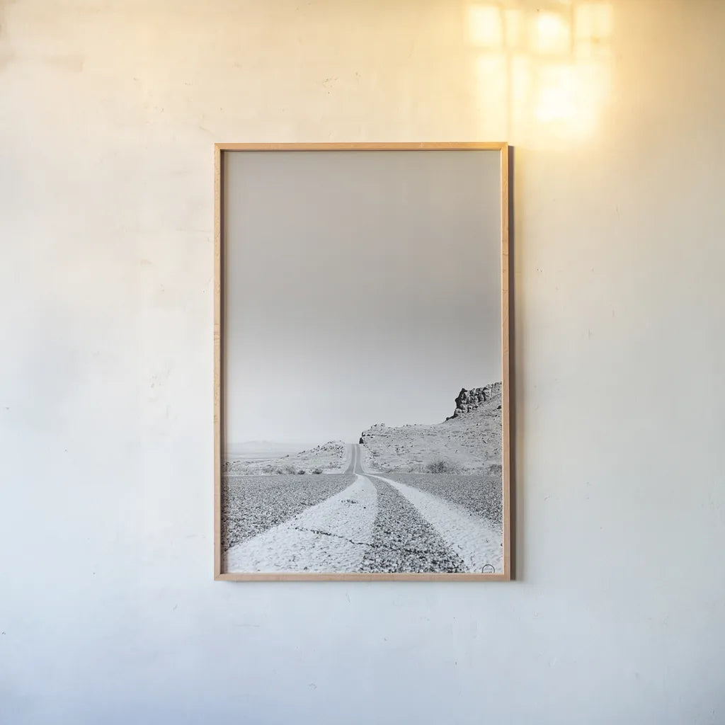 Into the Desert by Nathan Larson. shown as a paper print in a natural frame. Available as a archival giclee rolled canvas, fine art paper, or poster print. SKU 72025h.