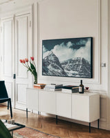 Jasper Mountain Series V by Nathan Larson. shown as a framed stretched canvas in a living room above a console. Available as a archival giclee rolled canvas, fine art paper, or poster print. SKU 93982i.