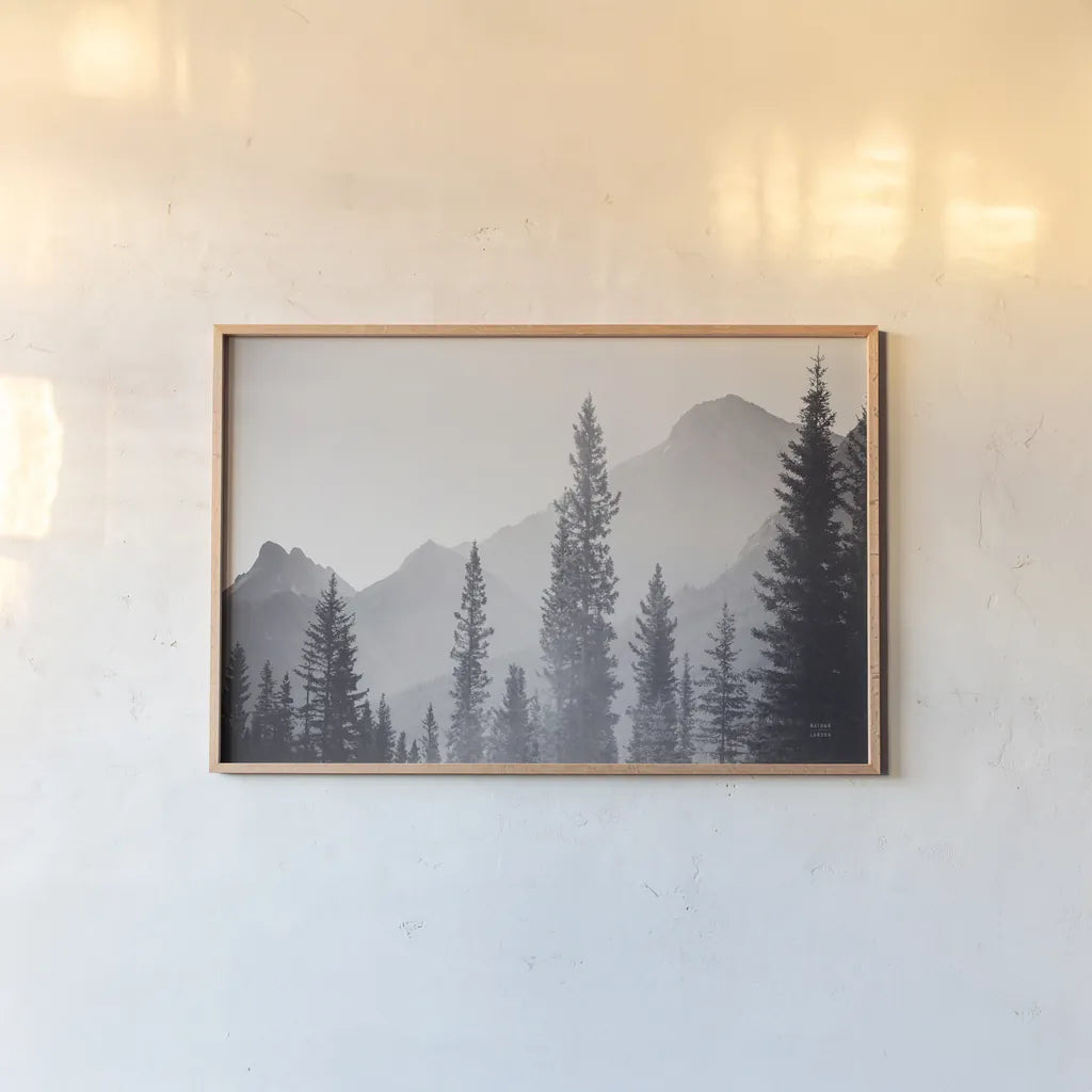 Kananaskis Country by Nathan Larson. shown as a paper print in a natural frame. Available as a archival giclee rolled canvas, fine art paper, or poster print. SKU 94836i.