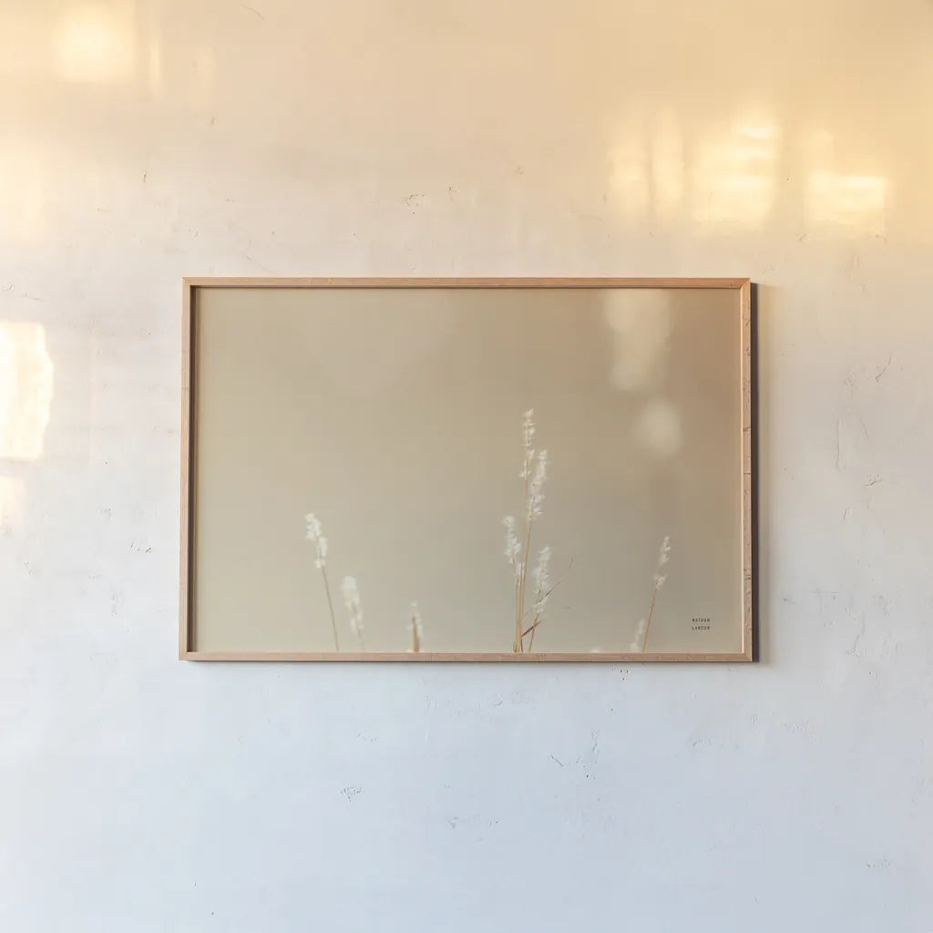 Lakeside Grasses I by Nathan Larson. shown as a paper print in a natural frame. Available as a archival giclee rolled canvas, fine art paper, or poster print. SKU 76208i.