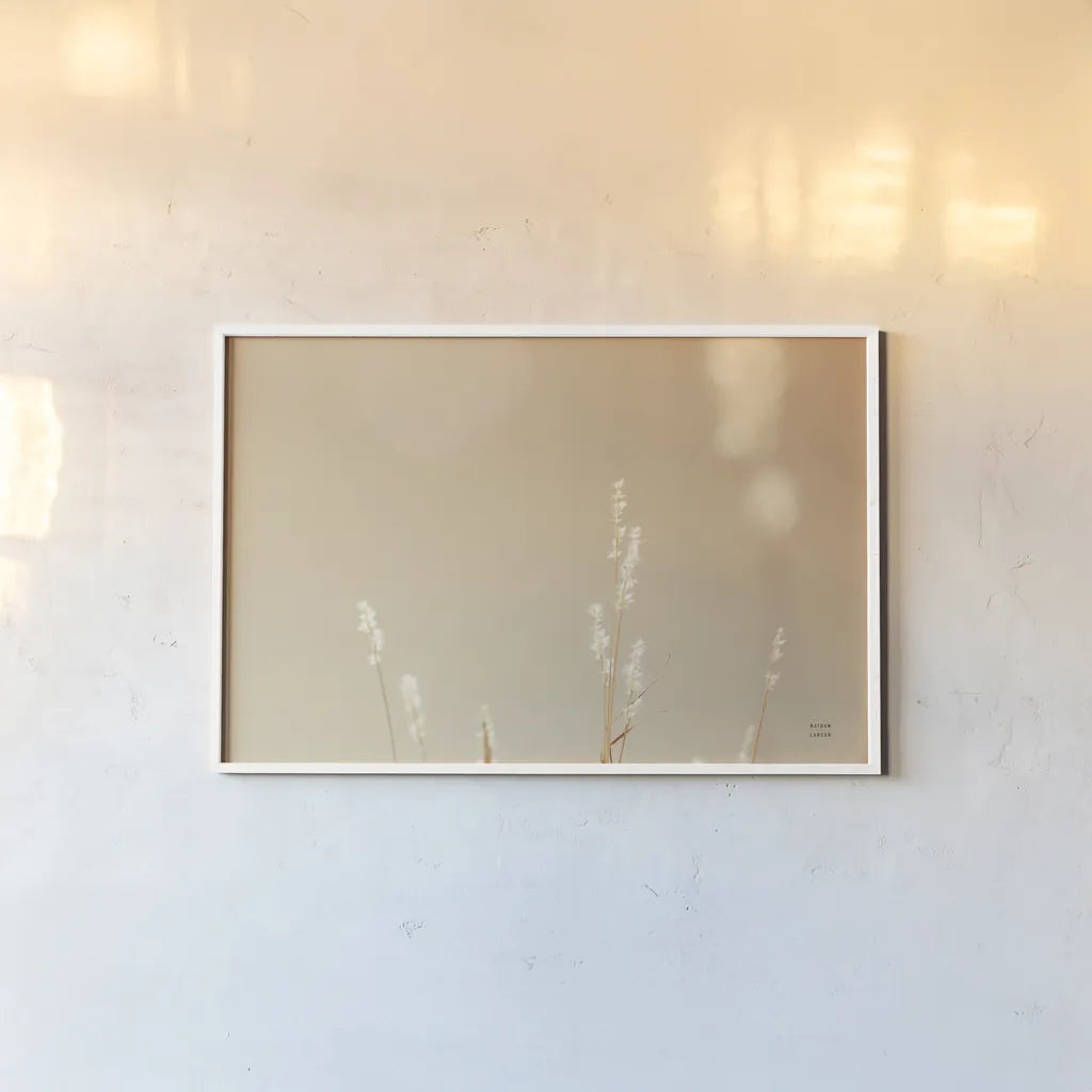 Lakeside Grasses I by Nathan Larson. shown as a paper print in a white frame. Available as a archival giclee rolled canvas, fine art paper, or poster print. SKU 76208i.