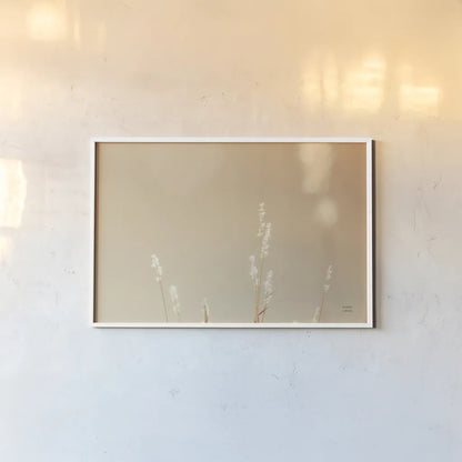 Lakeside Grasses I by Nathan Larson. shown as a paper print in a white frame. Available as a archival giclee rolled canvas, fine art paper, or poster print. SKU 76208i.