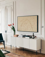Lakeside Grasses V by Nathan Larson. shown as a framed stretched canvas in a living room above a console. Available as a archival giclee rolled canvas, fine art paper, or poster print. SKU 76212i.