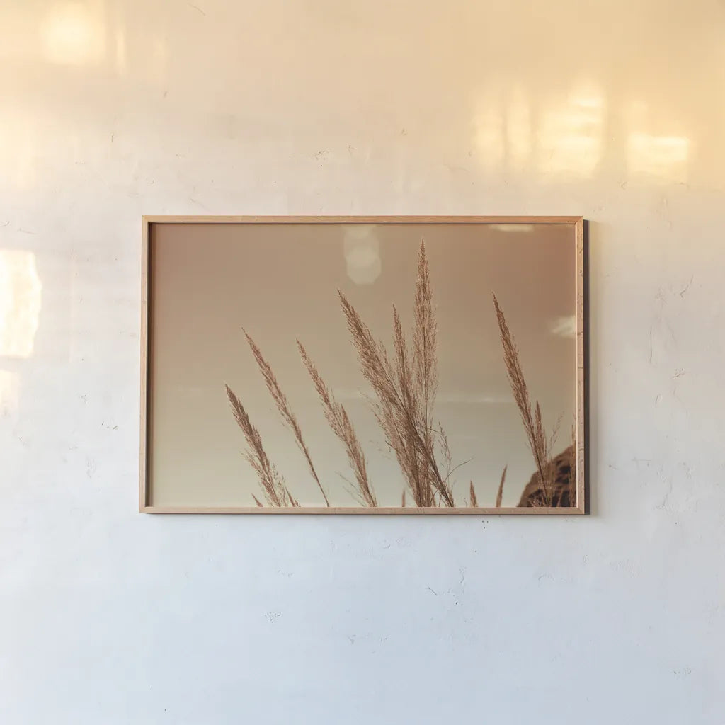 Lakeside Grasses VI by Nathan Larson. shown as a paper print in a natural frame. Available as a archival giclee rolled canvas, fine art paper, or poster print. SKU 76213i.