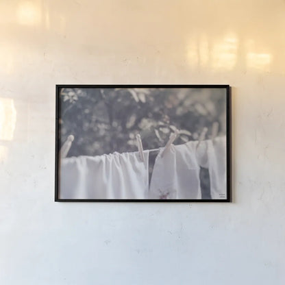 Laundry Day I by Nathan Larson. shown as a paper print in a black flame. Available as a archival giclee rolled canvas, fine art paper, or poster print. SKU 99407i.