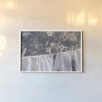 Laundry Day I by Nathan Larson. shown as a paper print in a white frame. Available as a archival giclee rolled canvas, fine art paper, or poster print. SKU 99407i.