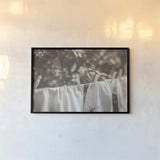 Laundry Day I Neutral by Nathan Larson. shown as a paper print in a black flame. Available as a archival giclee rolled canvas, fine art paper, or poster print. SKU 99411i.