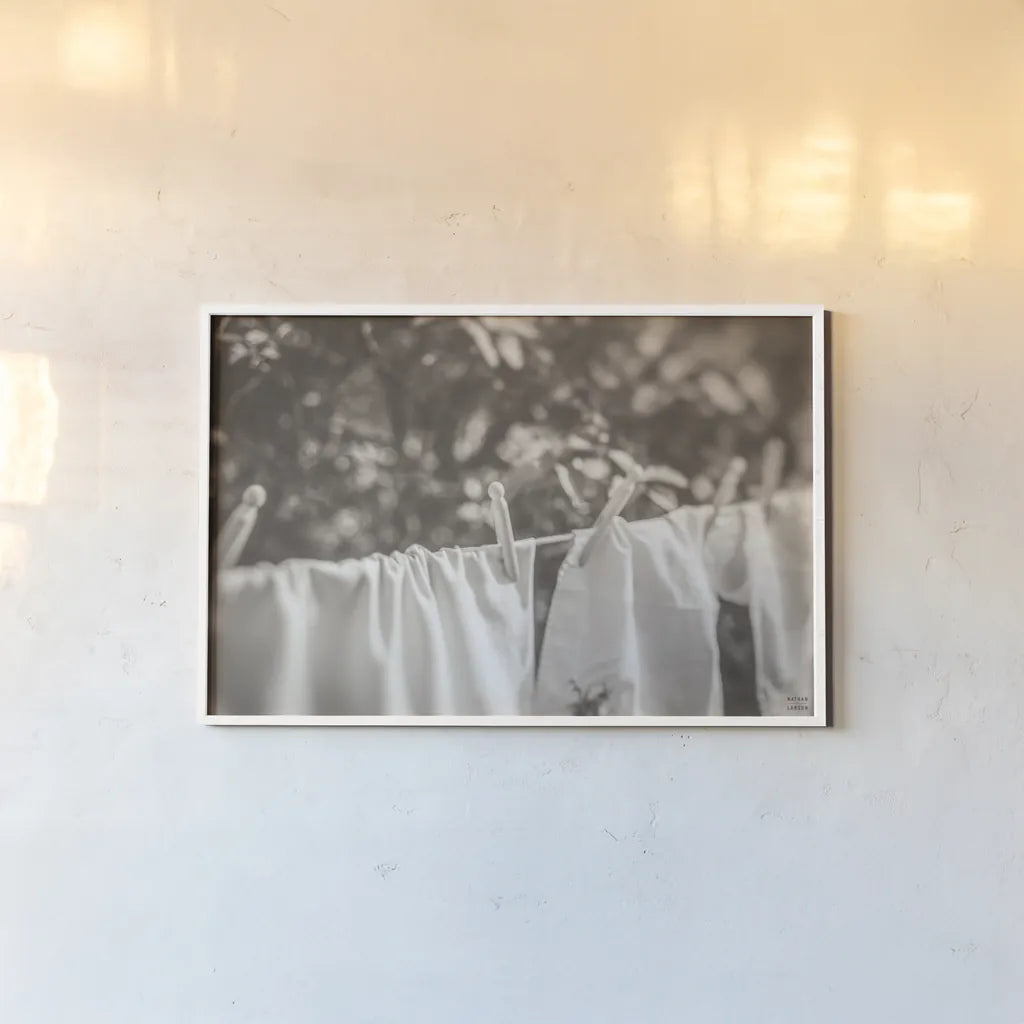 Laundry Day I Neutral by Nathan Larson. shown as a paper print in a white frame. Available as a archival giclee rolled canvas, fine art paper, or poster print. SKU 99411i.