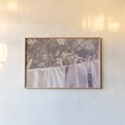 Laundry Day I Pastel by Nathan Larson. shown as a paper print in a natural frame. Available as a archival giclee rolled canvas, fine art paper, or poster print. SKU 99409i.