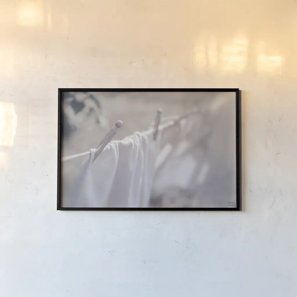 Laundry Day II by Nathan Larson. shown as a paper print in a black flame. Available as a archival giclee rolled canvas, fine art paper, or poster print. SKU 99408i.