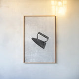 Laundry Iron Antique by Nathan Larson. shown as a paper print in a natural frame. Available as a archival giclee rolled canvas, fine art paper, or poster print. SKU 99393h.