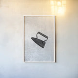 Laundry Iron Antique by Nathan Larson. shown as a paper print in a white frame. Available as a archival giclee rolled canvas, fine art paper, or poster print. SKU 99393h.