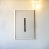 Laundry Pin by Nathan Larson. shown as a paper print in a white frame. Available as a archival giclee rolled canvas, fine art paper, or poster print. SKU 99388h.